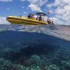 Yellow boat and reef below